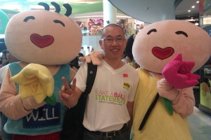 Taking photo with the maskot Their hair is longer than mine