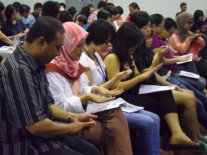 Teacher inspecting nails